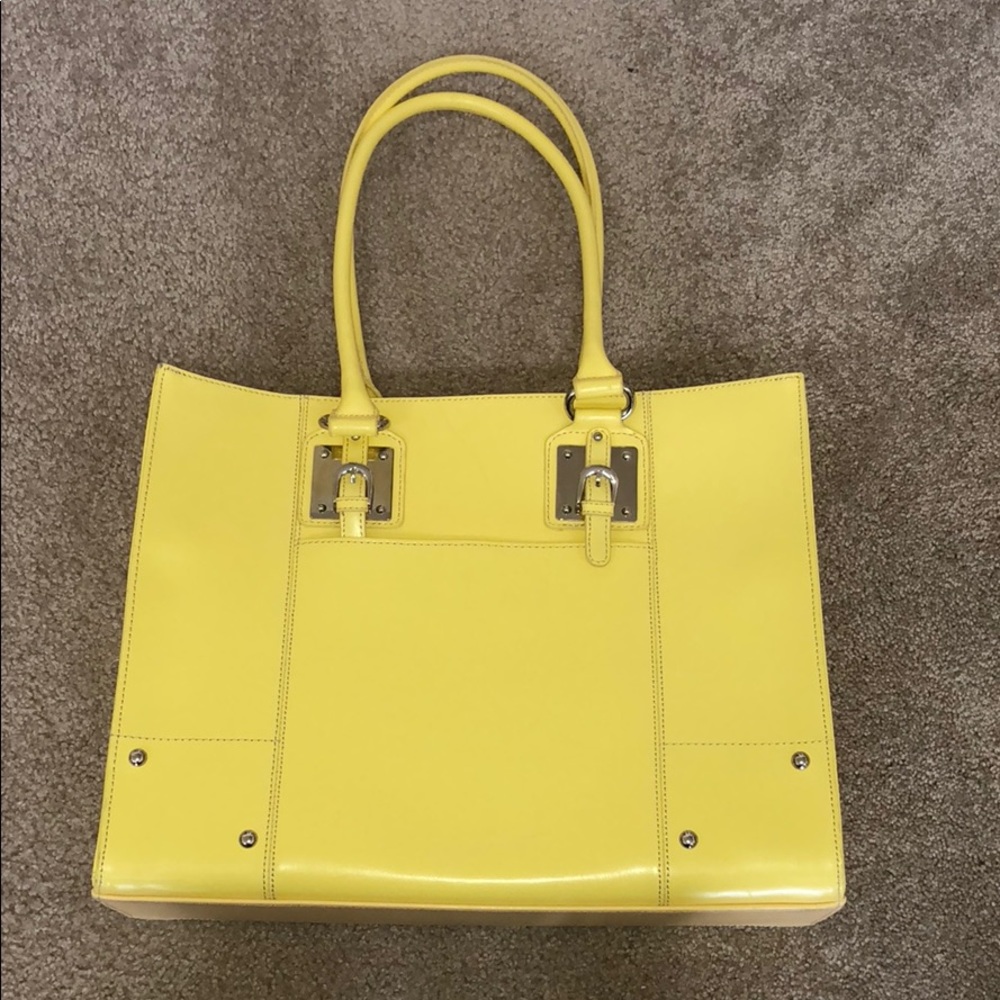 Wilson’s leather yellow purse